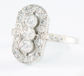 An 18ct white gold up-finger Art Deco style diamond ring, approx. 1.1ct, size L 1/2 