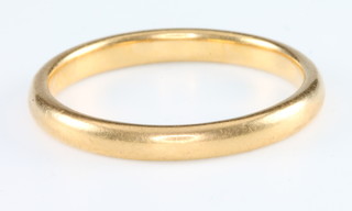 A 22ct yellow gold wedding band, size N 3.3 grams 