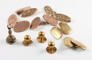 A pair of 18ct yellow gold cufflinks and studs 8,6 grams and 2 pairs of 9ct yellow gold cufflinks 9.5 grams