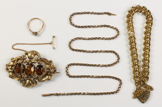 A Victorian repousse hardstone brooch and minor costume jewellery