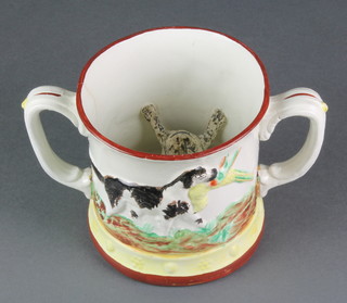 A Victorian Staffordshire style 2 handled mug with hunting dogs and birds with frog interior 5 1/2" 