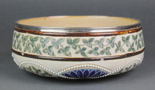 A Royal Doulton salad bowl with silver collar decorated with a band of stylised flowers 1880 10" 