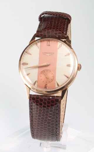 A gentleman's Longines 18ct rose gold wristwatch with 2 colour dial and seconds at 6 o'clock on a leather strap