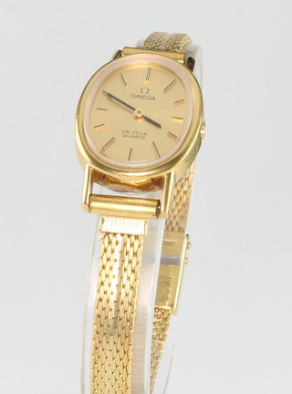 A lady's gold plated Omega Deville quartz wristwatch, boxed 