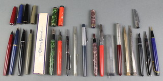 A green marbled Conway Stewart pen boxed, a purple marble Burnham no.56 and other fountain pens and 6 pencils