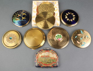 A Stratton compact decorated with flying ducks and 8 others