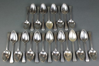 24 George III silver dessert spoons with chased armorial, London 1815, Maker William Edwards, 1000 grams 