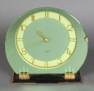An Art Deco electric mantel timepiece contained in a mirrored glass frame 25"h