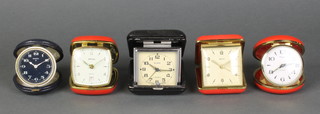 A Slavia travelling alarm clock and 4 other alarm clocks