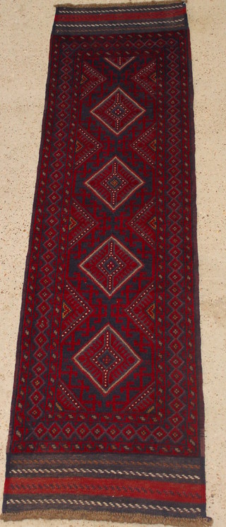 A Persian blue and red ground Meshwani runner with 4 diamonds to the centre 92" x 25" 
