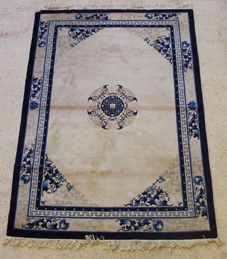 A Chinese blue and white ground rug with central medallion 97" x 66" 