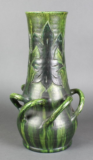 A 1920's Studio Pottery baluster vase with 6 twist handles, incised with stylised leaves 18"