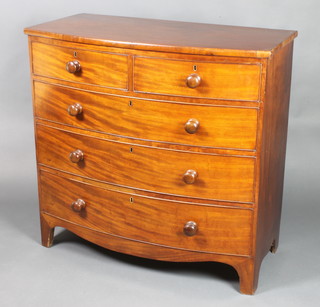 A 19th Century mahogany bow front chest of 2 short and 3 long drawers with tore handles, raised on bracket feet 39 1/2"h x 41"w x 20 1/2"d 