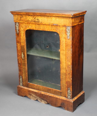 A Victorian inlaid walnut Pier cabinet with gilt metal mounts, enclosed by an arched panelled door 34 1/2"h x 33"w x 12"d 