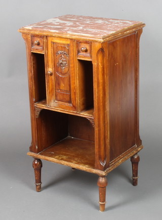 A 19th Century French oak bedside cabinet with pink veined marble top, the base fitted a cupboard and flanked by 2 drawers above a recess, raised on turned supports 33"h x 18"w x 15"d  