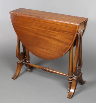 A Victorian mahogany oval Sutherland table with inlaid and crossbanded top, raised on lyre supports 25 1/2"h x 27"w x 6 1/2" when closed x 35" when open 
