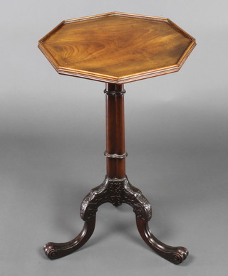 An Edwardian Chippendale style octagonal mahogany wine table, raised on turned column and tripod base 27"h x 17"w x 16"d 