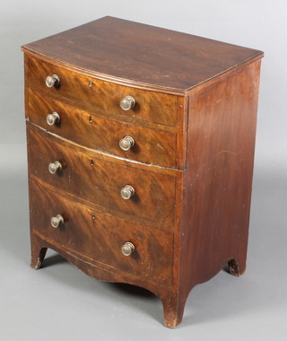 A Victorian mahogany bow front commode with hinged lid, raised on bracket feet 24"h x 22"w x 17"d 