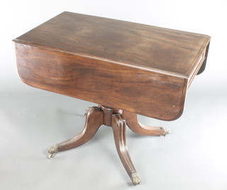 A 19th mahogany pedestal Pembroke table fitted a frieze drawer and raised on a turned column an tripod supports 28 1/2"h x 36"w x 21" when closed x 40" when open 
