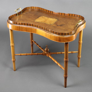 A Georgian style shaped and inlaid mahogany 2 tier tea tray, raised on a stand with faux bamboo legs and X framed stretcher 22"h x 23"w x 15"d 