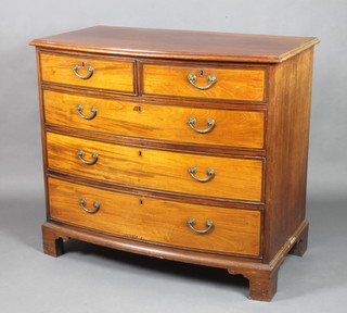 A 19th Century mahogany bow front chest of 2 short and 3 long drawers, raised on bracket feet 38 1/2"h x 44"w x 24"d 