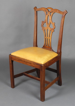 A 19th Century mahogany Chippendale style chair with pierced vase shaped slat back and upholstered drop in seat, raised on square supports 