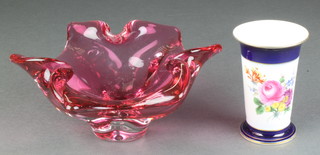 A cranberry glass studio dish 9", a late Meissen tapered vase decorated spring flowers 