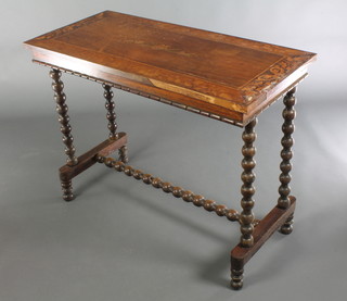 A 19th Century mahogany Pembroke table fitted a drawer and raised on square tapering supports ending in brass caps and casters 28"h x 34"w x 17" 1/2" when closed x 36" when open 