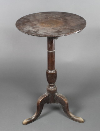 A 19th Century circular mahogany snap top wine table, raised on pillar and tripod base 27"h x 17" diam.
