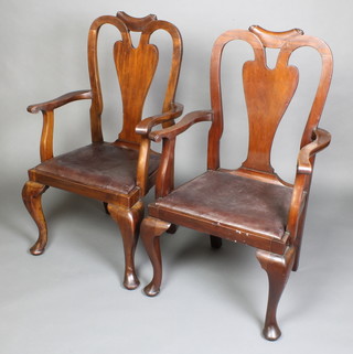 A pair of Philadelphia style mahogany slat back carver chairs with upholstered drop in seats, raised on cabriole supports