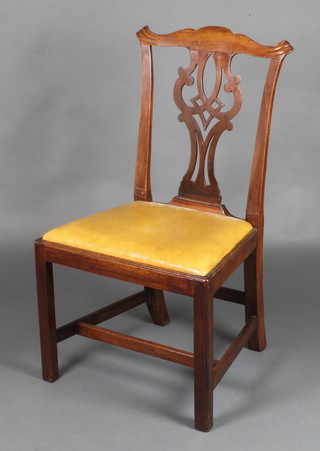 A 19th Century mahogany Chippendale style slat back dining chair with upholstered drop in seat, raised on square supports with H framed stretcher 