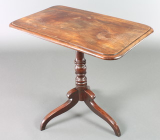 A 19th Century rectangular mahogany snap top wine table raised on turned column and tripod supports 28 1/2"h x 13 1/2"w x 18 1/2"d 