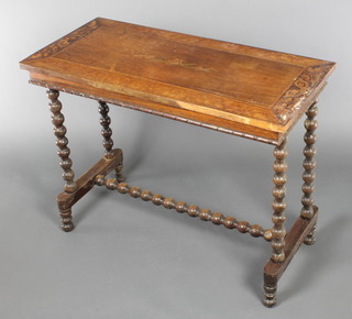 A Victorian rectangular inlaid rosewood stretcher table, raised on ring turned supports with H framed stretcher 27 1/2"h x 35 1/2"w x 17"d 