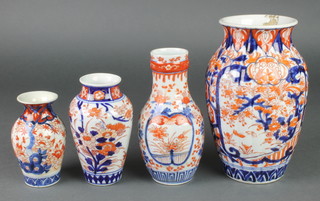 A late 19th Century Imari fluted baluster vase decorated with panels of flowering trees 9" and 3 other vases 3", 6" and 8" 
