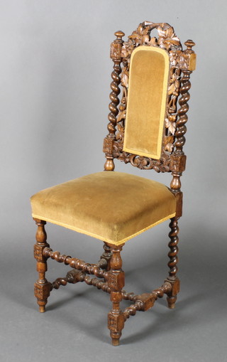 A Victorian carved oak high back chair with upholstered seat and back, raised on turned and block supports with spiral turned H framed stretcher (frame loose)