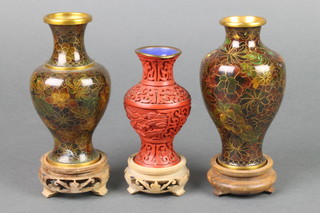 A cinnabar lacquer club shaped vase decorated landscape 4" (slight chip to rim) together with 2 brown ground and floral patterned cloisonne enamelled vases 5"  