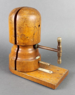 A turned wooden hat block marked patented no.318712