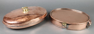 A Victorian oval copper and brass foot warmer 3" x 14" and a ditto oval twin handled plate warmer 2" x 11" 