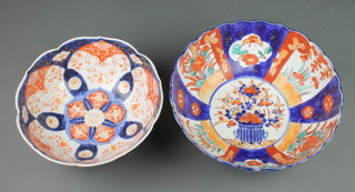 A late 19th Century Imari bowl with panels of stylised flowers 8 1/2", a later ditto 10" 
