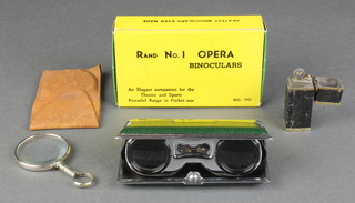 A brass pocket lighter (hinge f), a magnifying glass and a pair of Rand No.1 opera binoculars 