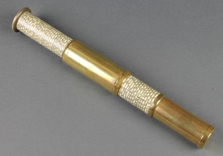 A Carbic Ltd of London brass column calculator the base marked E0937 