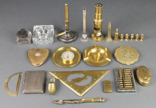 An oval brass tobacco box with hinged lid 3", a Griffin brass and iron bunsen burner, a brass protractor 3", a stationery office glass and metal square inkwell, a student's brass single pillar microscope etc 