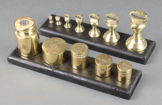 5 Avery brass bank money weights together with 7 brass bell weights