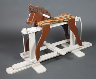 A 1940's wooden painted rocking horse 49" 