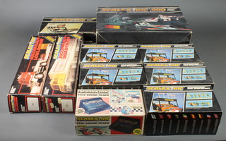 A Scalextric 200 C559 set boxed (hand controllers missing), 5 C705 grandstand and spectators, TC275 auto start, AC450 sound track, 2 Juggernaut road train C301 and C302 boxed, various track etc 