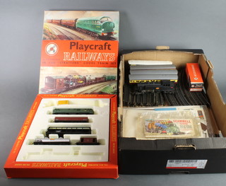 A Playcraft PR.1450 Euston passenger train set boxed, a Triang American style locomotive, 4 ditto Triang tenders and a small quantity of rails 