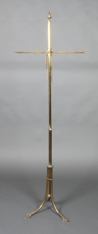A Victorian adjustable brass pole screen banner, the octagonal column raised on 3 splayed feet 62"h,  23 1/2" x 18"
