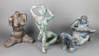 A bronzed resin figure of a seated naked lady 16" a bronzed resin figure of a naked lady 12" and a figure of 2 reclining people 17" 