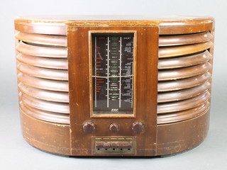A GEC radio catalogue no. BC4750 contained in a mahogany D shaped case, some scratches to the top 