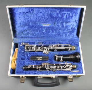 A Boosey and Hawkes oboe, cased 
